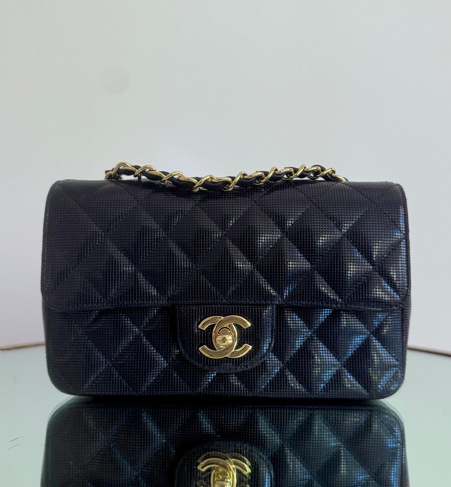 Chanel Black Pixelated Quilted  Mini Flap Gold Hardware